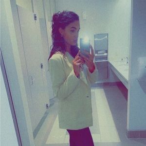 Bright yellow blazer. Great for a casual or dress up day in the office!